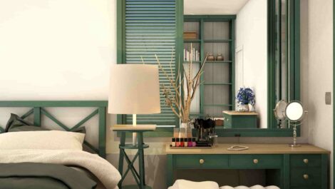 Rendering of a bed and vanity area in a small apartment.